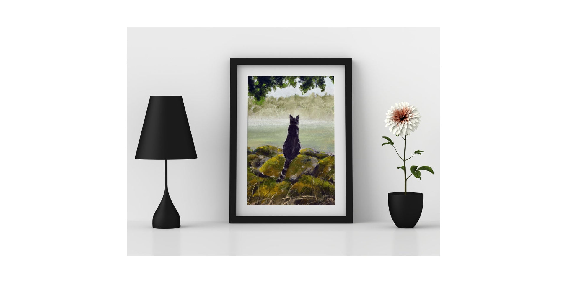 Black Cat artwork in a black frame on shelf between a black lamp and a white and orange dahlia flower in a black pot