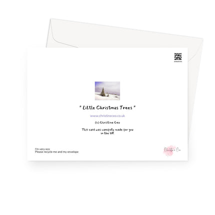 Greeting card with a snowy landscape and trees. Back view of card