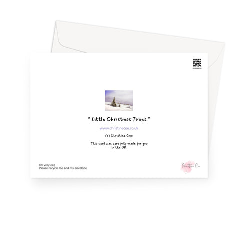 Greeting card with a snowy landscape and trees. Back view of card