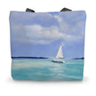 Tote bag with a white sailboat artwork design 