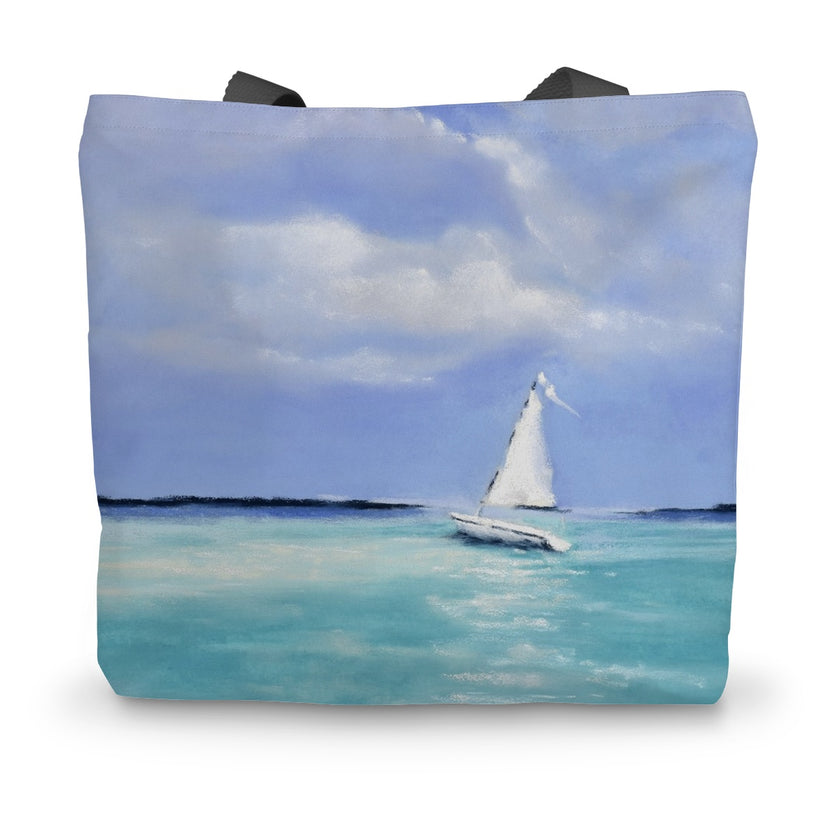 Tote bag with a white sailboat artwork design 
