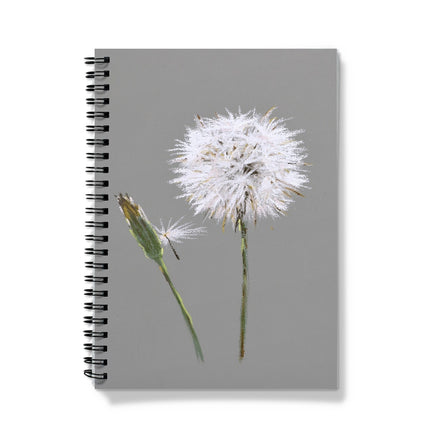 Notebook with a dandelion design on a gray background