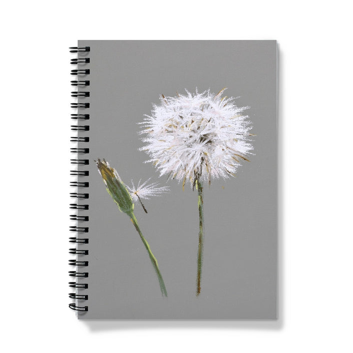 Notebook with a dandelion design on a gray background