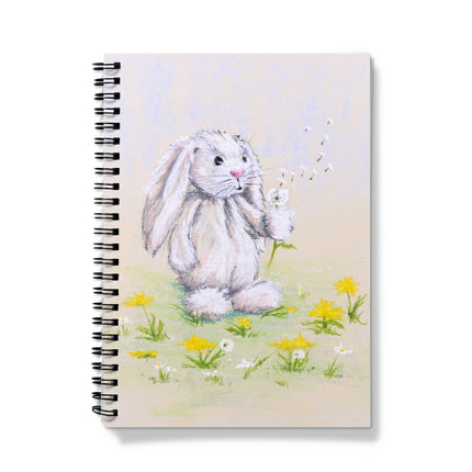 Notebook with a rabbit and dandelion seed head illustration 