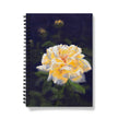 Notebook with a yellow rose flower design on a dark background