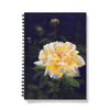 Notebook with a yellow rose flower design on a dark background