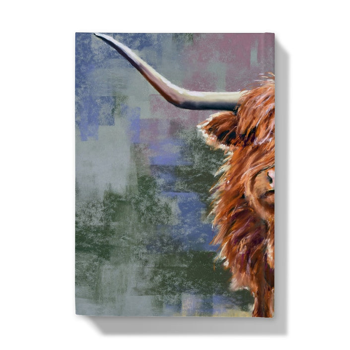 Hardback journal with a highland cow on the cover.