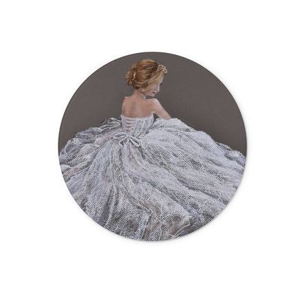 Round chopping board with a design of a woman in a white dress on a dark background