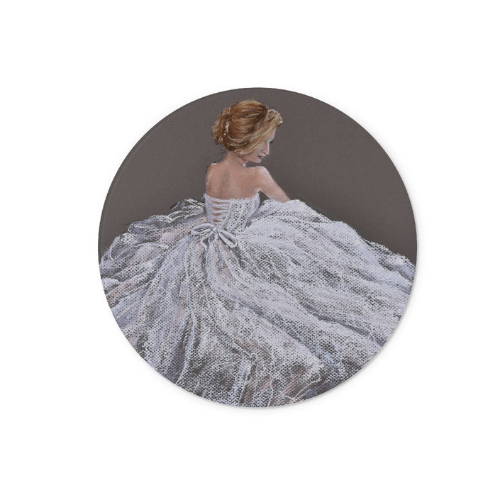 Round chopping board with a design of a woman in a white dress on a dark background