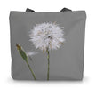 Tote bag with a dandelion design on a grey background