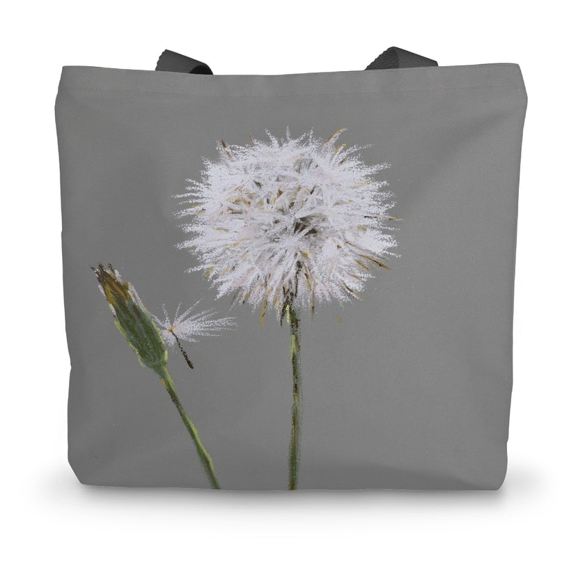Tote bag with a dandelion design on a grey background