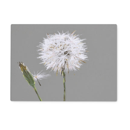 Rectangular chopping board, Dandelion seed head on a grey background