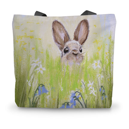 Tote bag with a rabbit in a field of flowers design