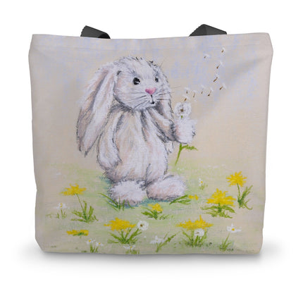 Tote bag with a rabbit and dandelion seed design 
