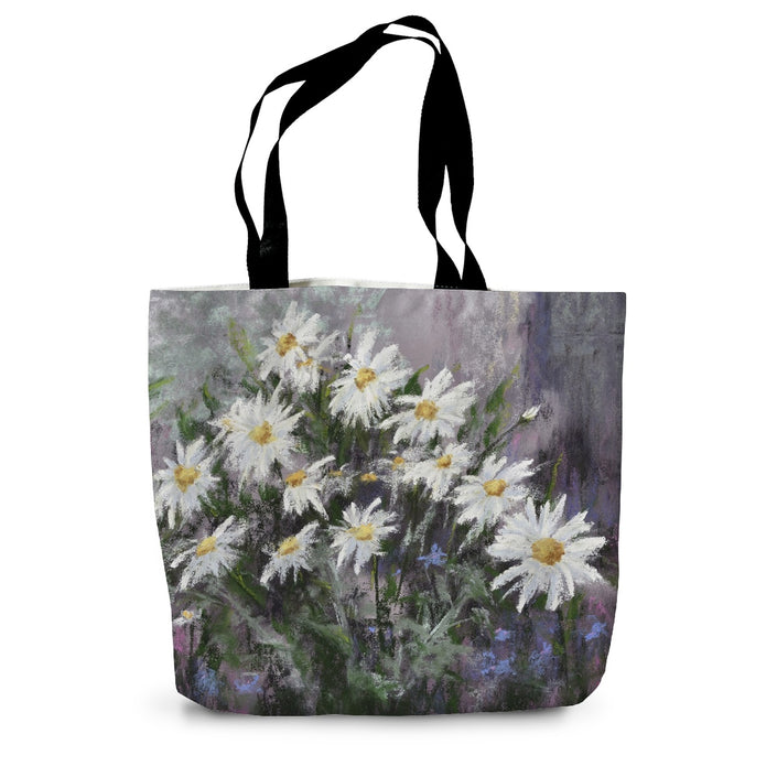 Tote bag with a design of white flowers on a colourful background