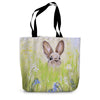 Tote bag with a rabbit in a field of flowers design