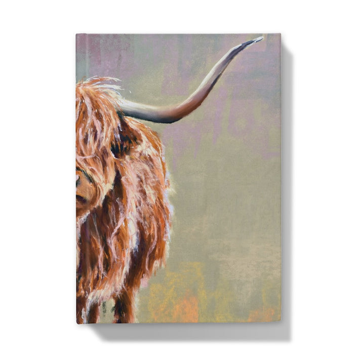 Hardback journal with a highland cow on the cover.