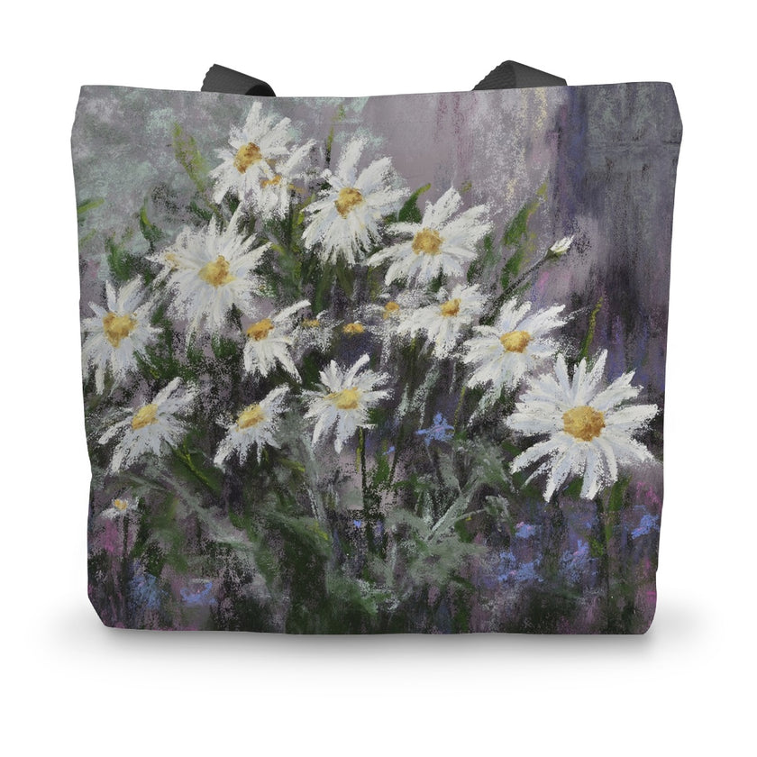 Tote bag with a design of white flowers on a colourful background