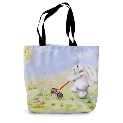 Tote bag with a rabbit design pushing a lawnmower in a flower meadow