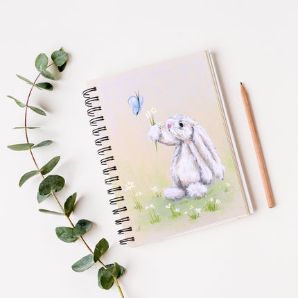 Rabbit, daisy flowers and butterfly artwork cover design, vegan-friendly, notebook