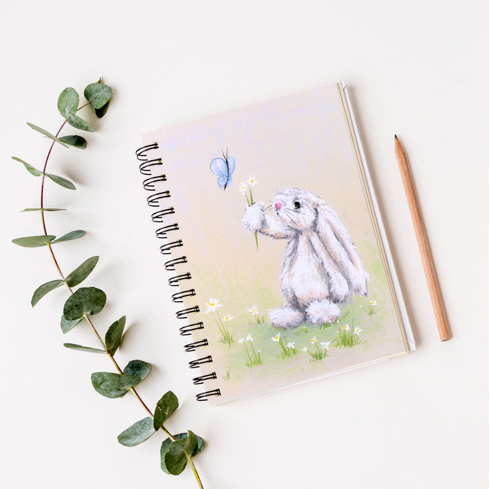 Rabbit, daisy flowers and butterfly artwork cover design, vegan-friendly, notebook