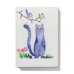 Whimsical purple feline looking at a bird in a tree, watercolour artwork on journal cover. Front cover