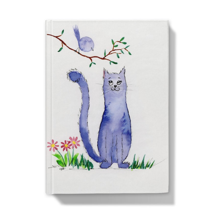 Whimsical purple feline looking at a bird in a tree, watercolour artwork on journal cover. Front cover