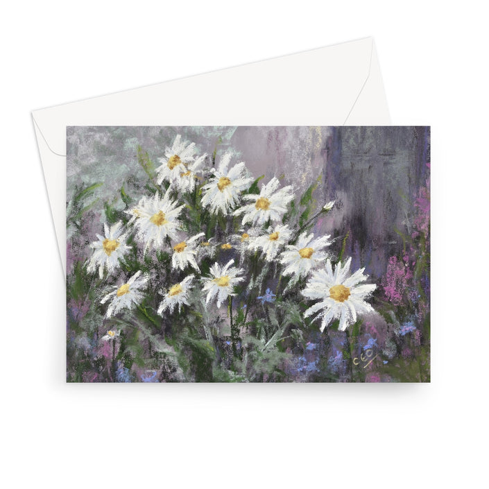 A landscape format greeting card featuring an impressionistic painting of white daisies with yellow centers among green and purple foliage, shown with a white envelope behind it on a light gray background.