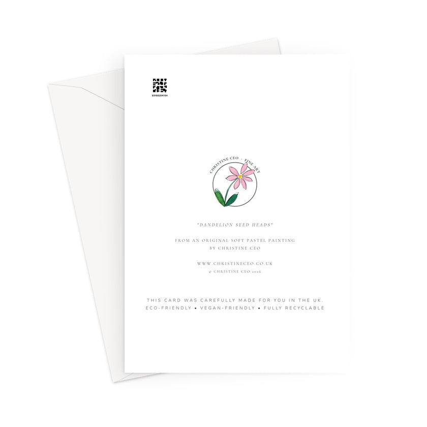 A white card with printed text and a small pink flower illustration, shown with a white envelope behind it on a light gray background.