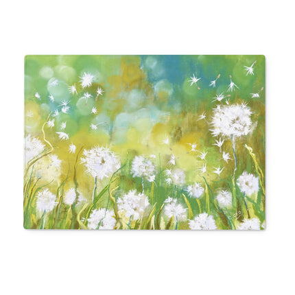 Rectangular chopping board with a floral design featuring white fluffy dandelion seed heads. 