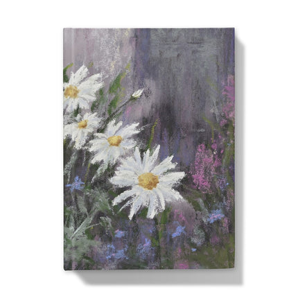 Notebook cover with a painting of white daisies and colourful background. Front cover