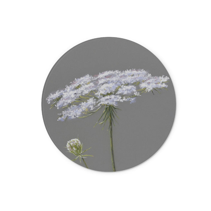 Circular chopping board. Illustration of white flowers on a gray background