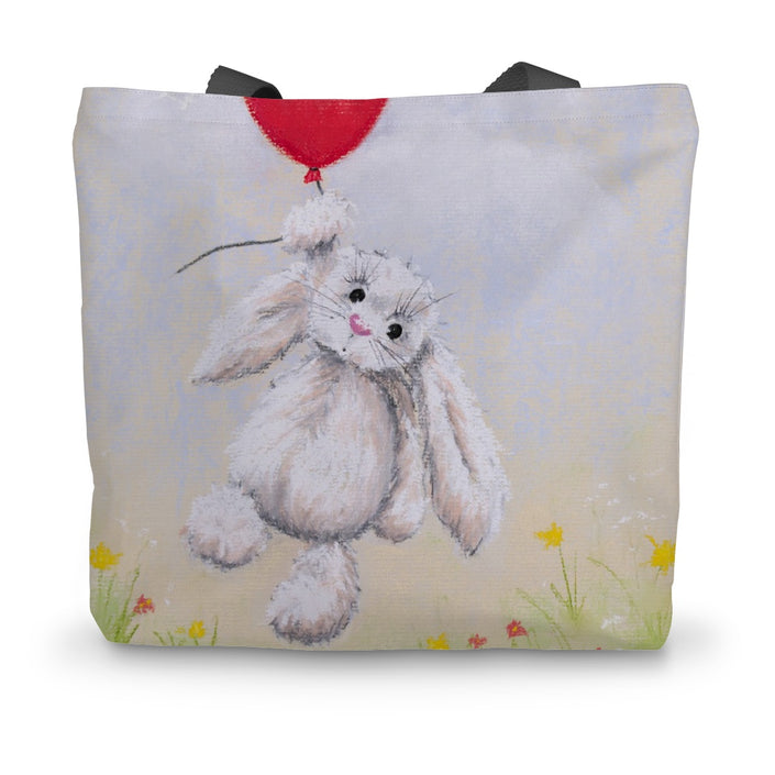 Tote bag with a bunny holding a red balloon 