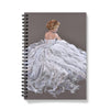 Notebook with a design of a woman in a white dress on a gray background