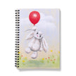 Notebook with a bunny holding a red balloon on the cover