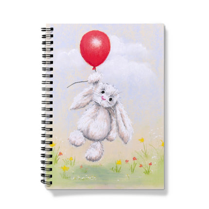 Notebook with a bunny holding a red balloon on the cover