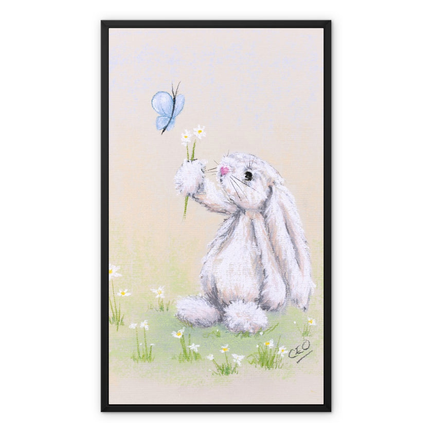 White rabbit, flowers and butterfly canvas art print within a modern black picture frame. 