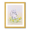 Rabbit and dandelions wall art print in a gold frame. 