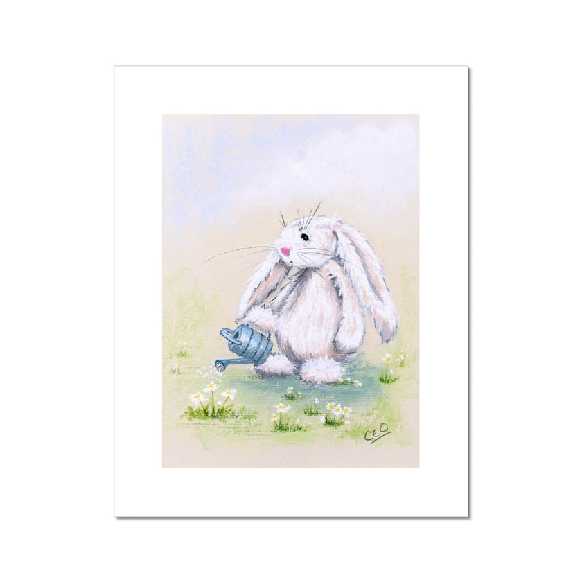 Adorable white rabbit watering the daisy flowers with a little blue watering can, fine art print. 